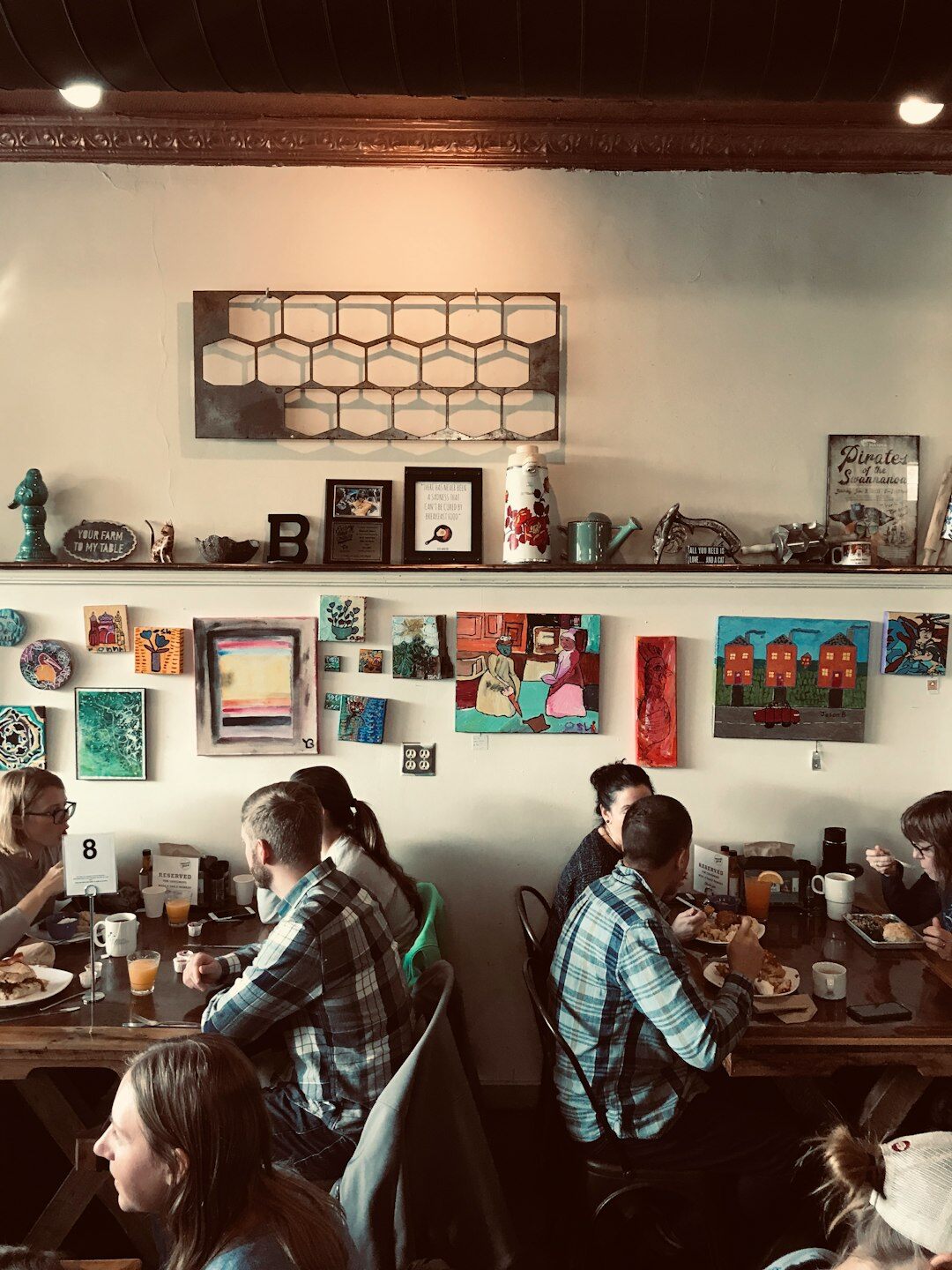 Scandinavian friends at a cozy hygge cafe